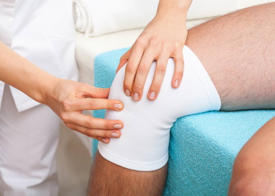 Боль в коленях, причины и лечение
